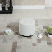 Pouf Ottokar repose-pieds design pivotant 360° blanc acier chromé luxe