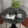 Table à manger Ilrario ronde acier MDF mélaminé noir
